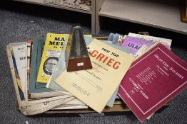 A box of early 20th century piano sheet music and a WIllner.