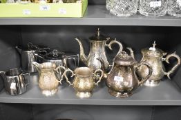 Two part tea sets including a Swan Brand stainless steel and a silver plated chase worked set.