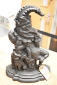 A genuine Victorian cast iron door stop in the form of Mr. Punch