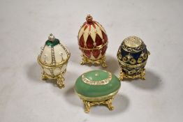 Four modern Atlas Edition collectors eggs having original boxes.