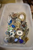 A selection of vintage costume jewellery including Scottish style brooches and pin badges.