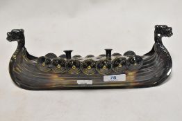 A mid century Scandinavian silver plated candle holder table centre piece in the form of a Viking