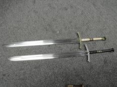 Two modern Game of Thrones Two handled Broadswords, one having copy bone grip and other having