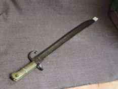 A Belgium Engineers Bayonet 1868 model, blade marked 1877 numbered V2740 on guard, other marks