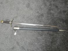 A WW2 German Luftwaffe Officer's Sword 1934 pattern with white metal pommel and cross guard, the