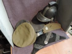 A Bicorne Hat having makers name H Poole & Co, Saddlerow having white metal decorated badge, along