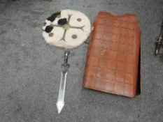 A modern re-enactment leather medieval style Tunic having belt and buckle to sides, studded front