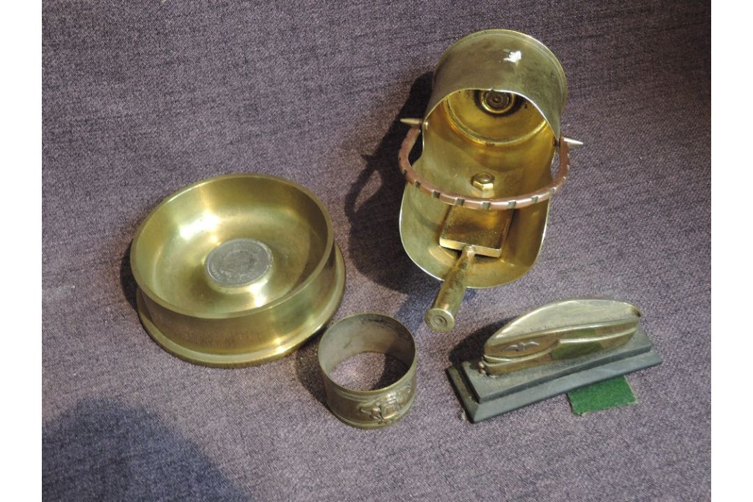 A small collection of Trench Art including miniature Coal Scuttle and Shovel, Air Force Cap,