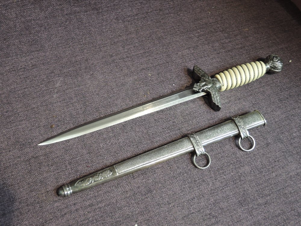 A German WW2 Luftwaffe Dagger 1937, Cross Guard in the form of a Eagle clutching Swastika,