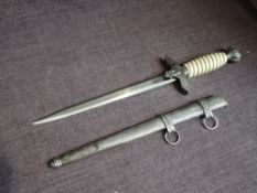 A German WW2 Luftwaffe Dagger 1937, Cross Guard in the form of a Eagle clutching Swastika,