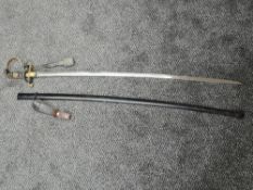 A German WW2 Officers Sword with metal scabbard, blade marked PUMA Solingen, on reverse No6, with