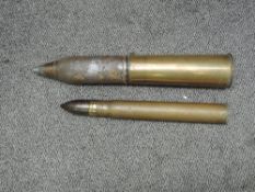 Two Brass Complete Shells, 18 Pounder WW1 Case with WW2 fuse, length 59cm and 3 Pounder 1932 case,