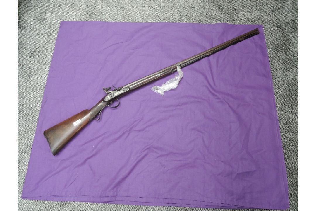 A 19th century or earlier Flintlock Musket having hexagonal and round barrel, marked on lock Jolley,