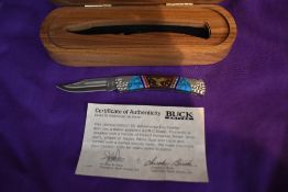 A Buck knife, in wooden case, model 55 yellow horse day hunter, limited edition number 118 of 500,
