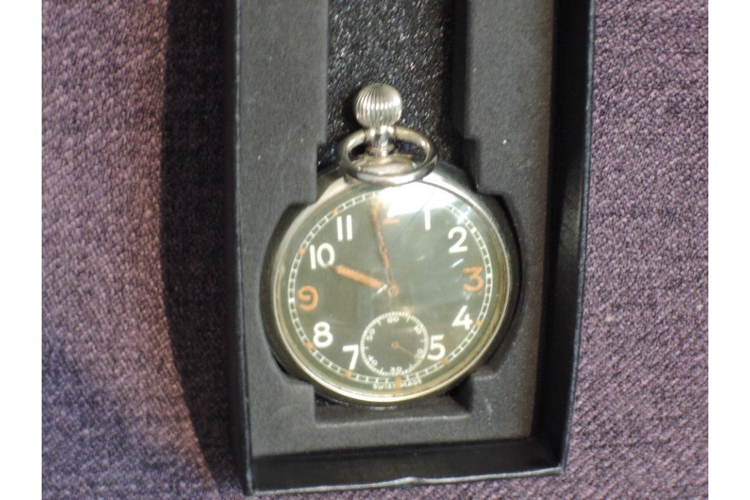 A WW2 Military Pocket Watch, Swiss made, on reverse of case Military Arrow G.S.T.P K.4172