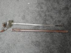 A British George V Infantry Officers Sword 1895 pattern, dome pommel, fish skin and twist wire grip,