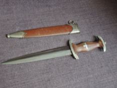 A German WWII SA Service Dagger 1933 with brown scabbard, brown grip, blade marked Alles Fur