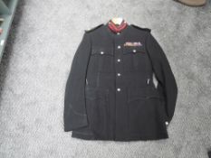 A ww2 period Black Military Officers Jacket and Trousers with red front of collar patches red collar