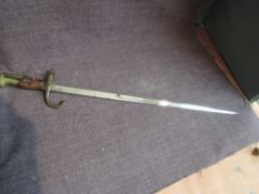 A French Gras Rifle Bayonet Model 1874, brass Pommel, wood Grip, marked on blade edge 1880, blade