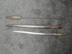 A French Bayonet for the Chassepot Rifle 1866, dated on edge 1868 with metal scabbard and leather