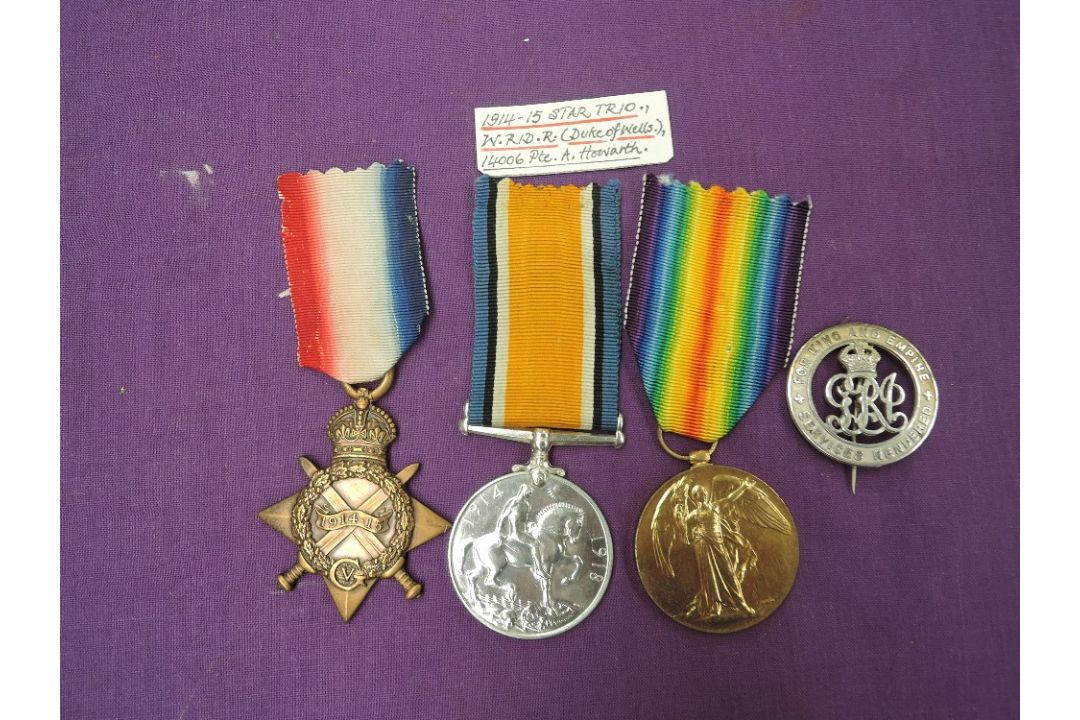 A WW1 Trio to 14006.PTE.A.Howarth.W.RID.R, 1914-15 Star, War Medal and Victory Medal along with a
