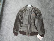 An unused reproduction Leather Flying Jacket by AVIREX Ltd, type A2, size XL, decorated on the