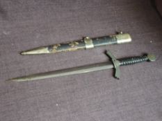 A German WWII Luftwaffe Flying Officers Dagger 1934, disc pommel with sun wheel swastika, leather