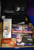 A Panasonic VHS-C Movie video camera in carrying case and a small selection of electronic items