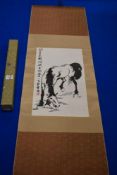 A Chinese paper and fabric wall hanging depicting a horse, with box.