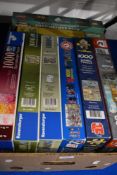 Eight 1000 piece jigsaw puzzles with a range of subjects including floral, country life and maps