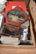 A selection of curios and trinkets including pocket knives, enamel pin badges and sew on scout