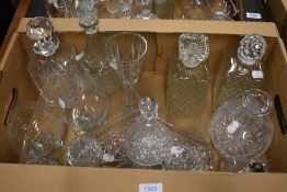 A mixed lot of vintage glass to include cut and pressed glass, including decanters, dressing table