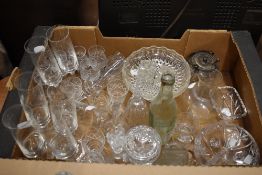 A box of mixed vintage and modern glass, including wine and spirit glasses.