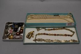 Costume jewellery including simulated pearls, bracelets and two scent bottles.