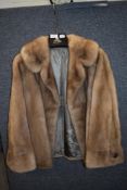 A vintage ladies fur coat jacket small size.