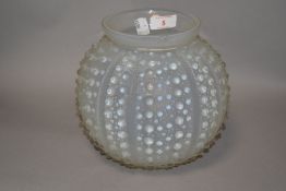 A 20th century R Lalique Oursin pattern Opalescent glass vase. Having two chips to body and one to