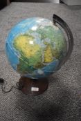 A vintage illuminated globe. Having slight damage.