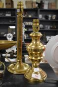 Two modern brass lamps including a classical column and a urn form base.
