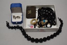 A small selection of costume jewellery including Mourning jewellery silver maple leaf brooch,