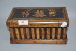 A late Victorian Italian Sorrento ware puzzle box in the form of library books.