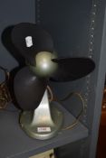 A vintage painted metal 1950s/60s G.E.C desk fan.