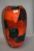 A large mid century West German floor vase in red orange and green. No.546 47cm tall. Having small