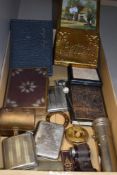 A selection of curios and trinkets including cigarette cases, torch, hat pin and letter rack.