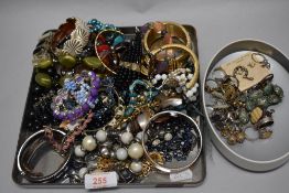 Costume jewellery including necklaces, bangles and brooches.