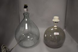 Two modern hand blown glass lamps including a mottled glass ball and tear drop design.