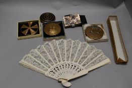 Four vintage ladies make up compacts including Stratton and a musical case.