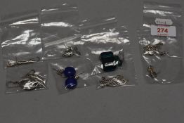 A selection of Celtic Scottish white metal earrings including leaf design and semi precious stones.