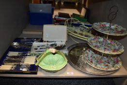 A selection of cutlery and flatware including a Sylvac flower bowl and a Midwinter chintz cake