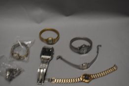 Seven modern wristwatches including Tissot, Citizen, Timex and Laurus.