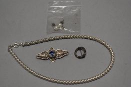 A 925 silver marked necklace with two brooches and a pair of pearl earrings.